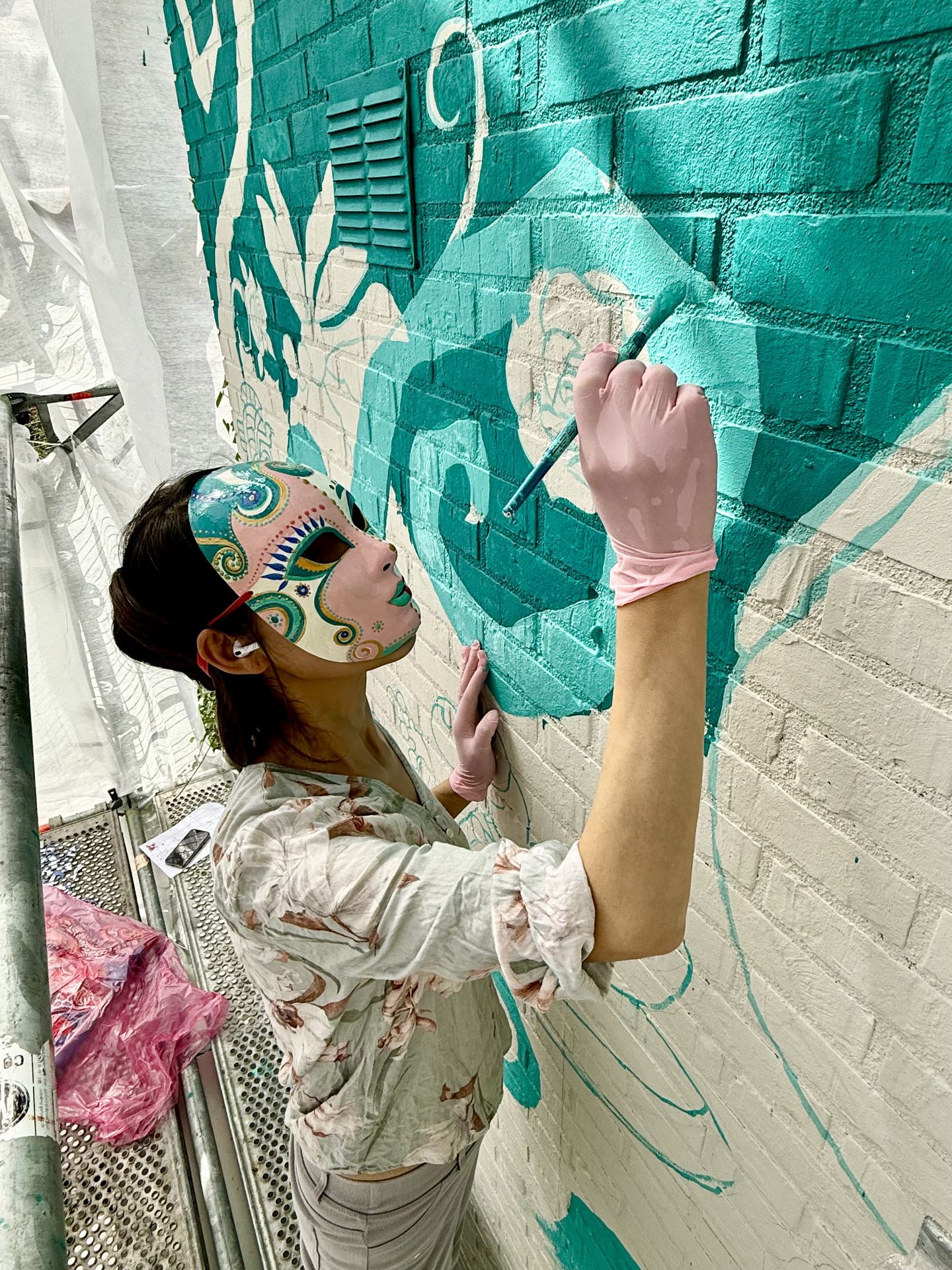 Clamaoing Painting The Mural